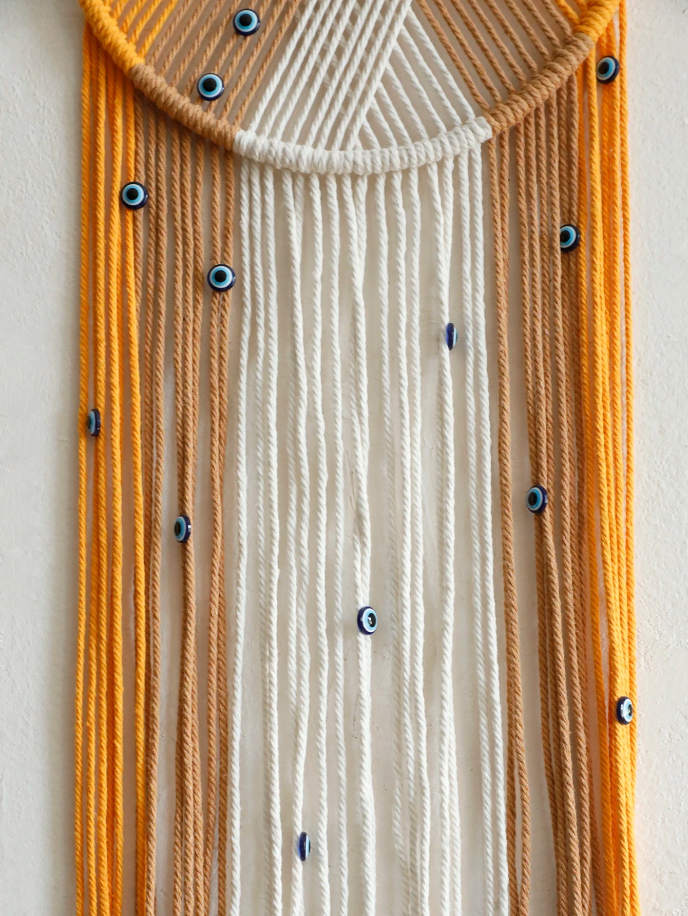Handmade Macrame Wall Hanging with Fringe and Evil Eye Beads – Boho Chic Yarn Tapestry Home Bedroom Living Room or Nursery Decor