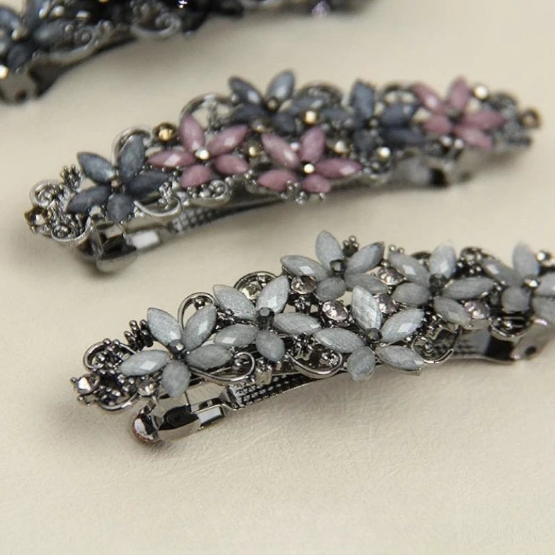 The new Korean version of the crystal flower spring hairpin elegant rhinestone wild ponytail hairpin women's hair accessories