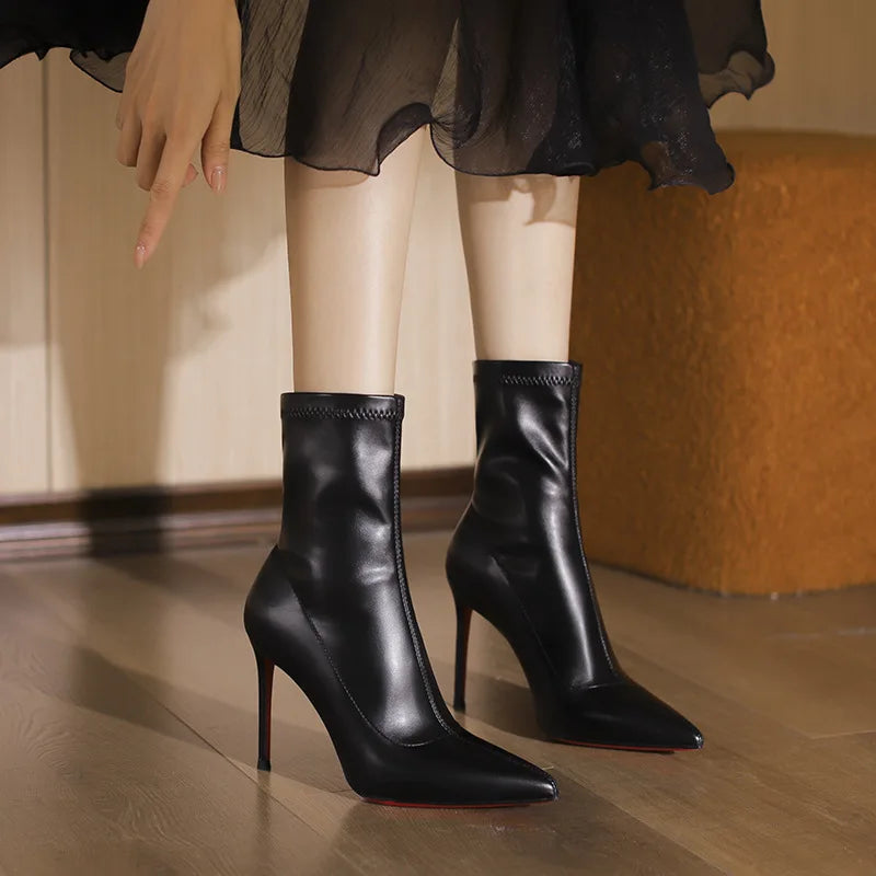 2025 autumn and winter new elastic slim boots with pointed leather and thin heels, black short boots for women with temperament