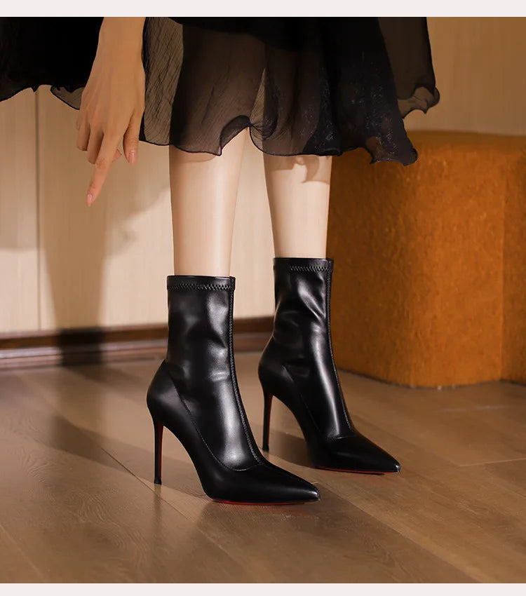 2025 autumn and winter new elastic slim boots with pointed leather and thin heels, black short boots for women with temperament