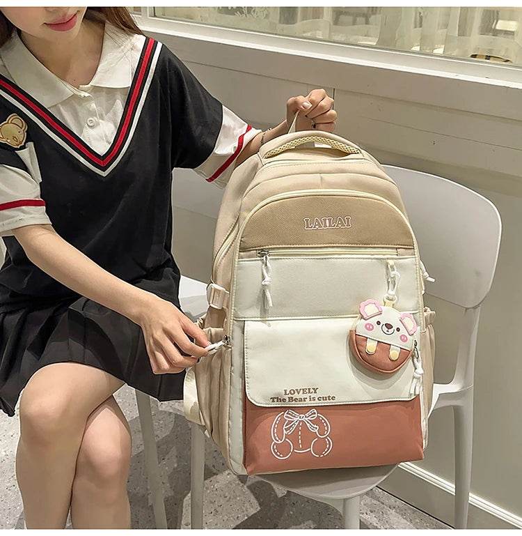 Schoolbag, a lightweight and large - capacity backpack designed for junior high school girls, aiming to relieve pressure and pro - AIAZ