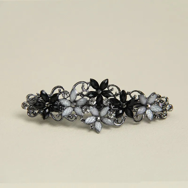 The new Korean version of the crystal flower spring hairpin elegant rhinestone wild ponytail hairpin women's hair accessories