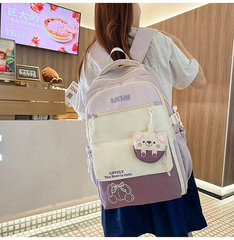 Schoolbag, a lightweight and large - capacity backpack designed for junior high school girls, aiming to relieve pressure and pro - AIAZ