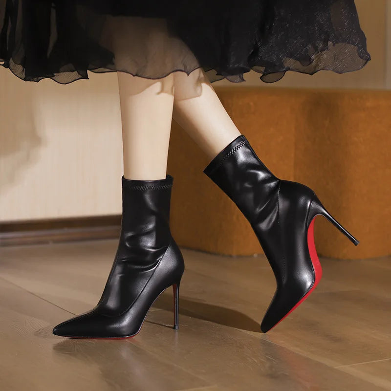 2025 autumn and winter new elastic slim boots with pointed leather and thin heels, black short boots for women with temperament