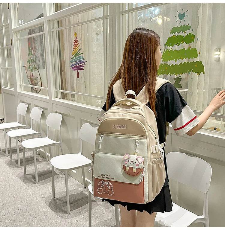 Schoolbag, a lightweight and large - capacity backpack designed for junior high school girls, aiming to relieve pressure and pro - AIAZ