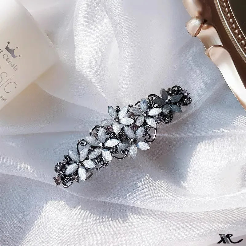 The new Korean version of the crystal flower spring hairpin elegant rhinestone wild ponytail hairpin women's hair accessories
