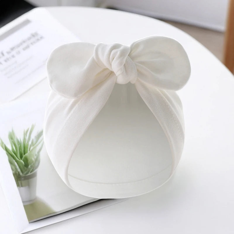 Pudcoco Baby Girls Turban Hat, Soft Elastic Cute Knotted Bow Hat Nursery Beanie Cap for Infant