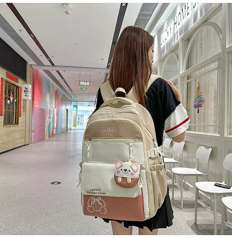 Schoolbag, a lightweight and large - capacity backpack designed for junior high school girls, aiming to relieve pressure and pro - AIAZ
