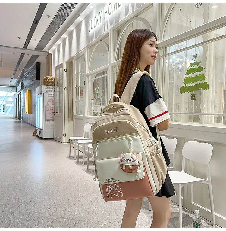 Schoolbag, a lightweight and large - capacity backpack designed for junior high school girls, aiming to relieve pressure and pro - AIAZ
