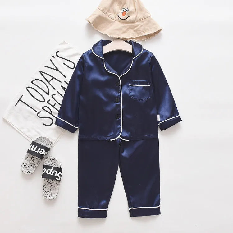 Korean version of childrens pajamas set silk satin long sleeve top+trousers two -piece male baby girl cartoon solid color set