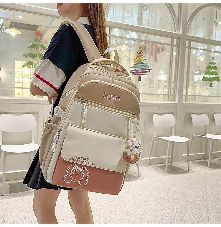 Schoolbag, a lightweight and large - capacity backpack designed for junior high school girls, aiming to relieve pressure and pro - AIAZ