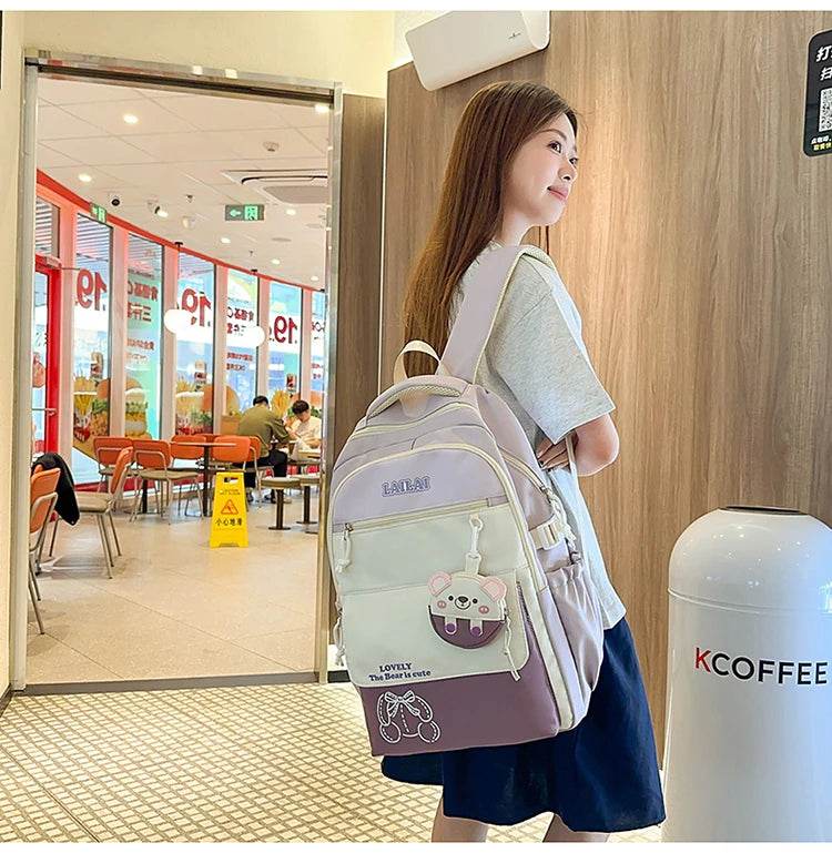Schoolbag, a lightweight and large - capacity backpack designed for junior high school girls, aiming to relieve pressure and pro - AIAZ
