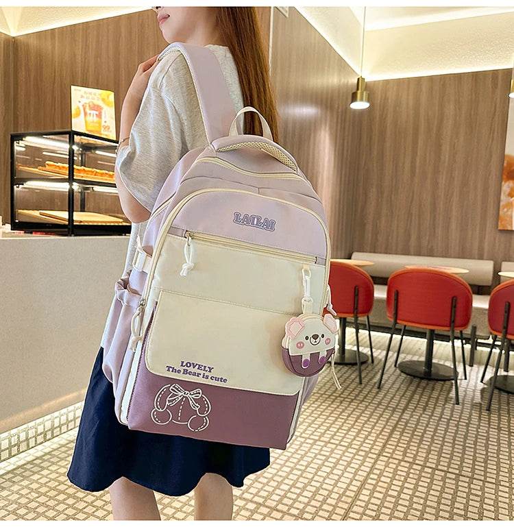 Schoolbag, a lightweight and large - capacity backpack designed for junior high school girls, aiming to relieve pressure and pro - AIAZ