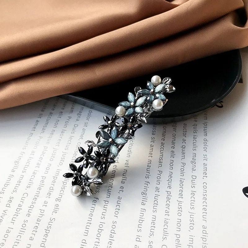 The new Korean version of the crystal flower spring hairpin elegant rhinestone wild ponytail hairpin women's hair accessories