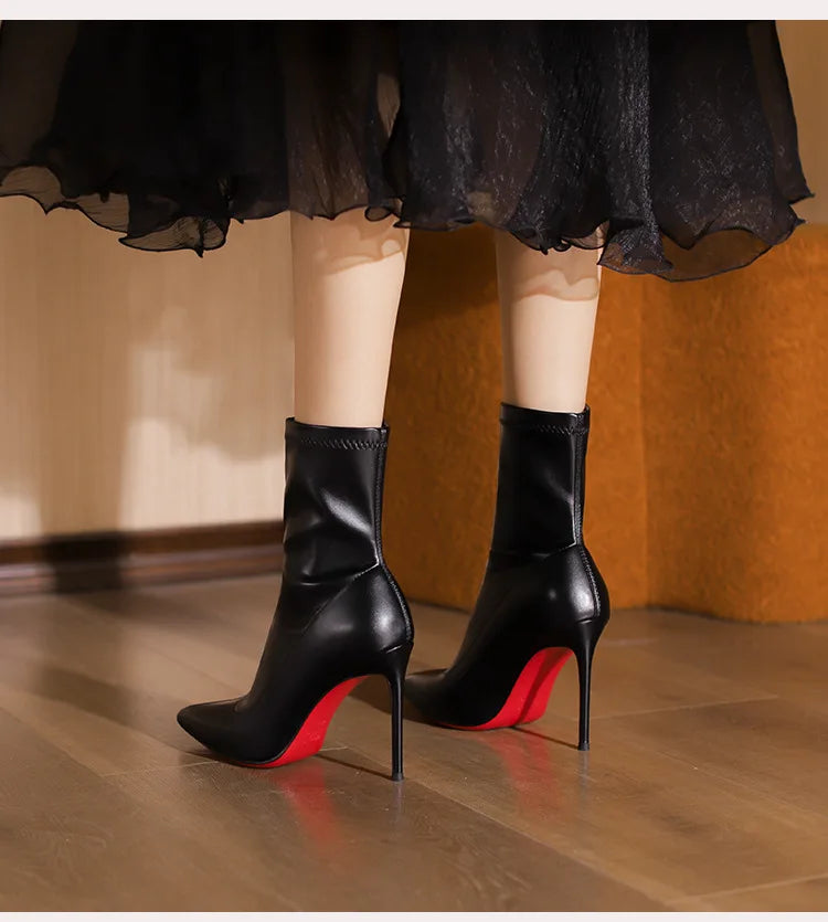 2025 autumn and winter new elastic slim boots with pointed leather and thin heels, black short boots for women with temperament