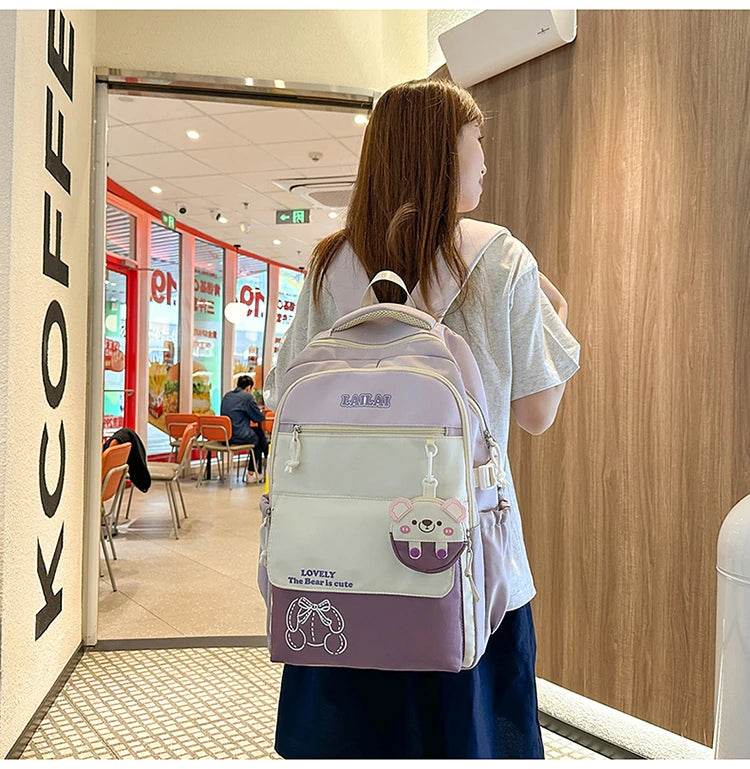 Schoolbag, a lightweight and large - capacity backpack designed for junior high school girls, aiming to relieve pressure and pro - AIAZ