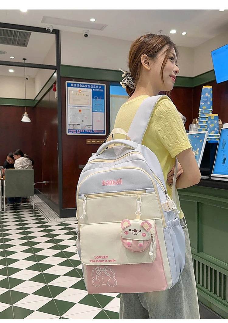 Schoolbag, a lightweight and large - capacity backpack designed for junior high school girls, aiming to relieve pressure and pro - AIAZ