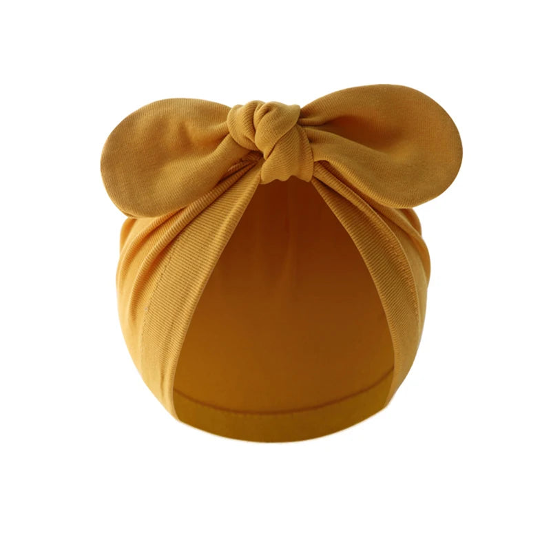 Pudcoco Baby Girls Turban Hat, Soft Elastic Cute Knotted Bow Hat Nursery Beanie Cap for Infant