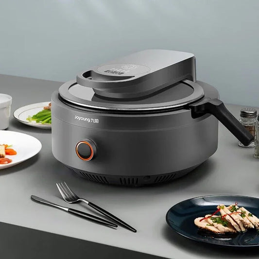 Household cooking robot automatically stir-fries over high heat without oil smoke