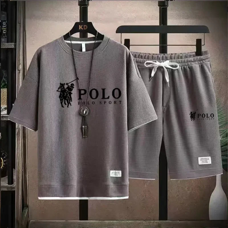 "2025 Men's Short-sleeved T-shirt + Sports Shorts Two-piece Summer Fashion Breathable Fitness Casual Jogging Set.