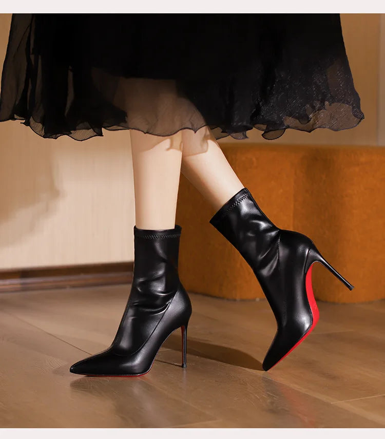 2025 autumn and winter new elastic slim boots with pointed leather and thin heels, black short boots for women with temperament