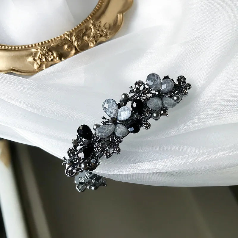 The new Korean version of the crystal flower spring hairpin elegant rhinestone wild ponytail hairpin women's hair accessories