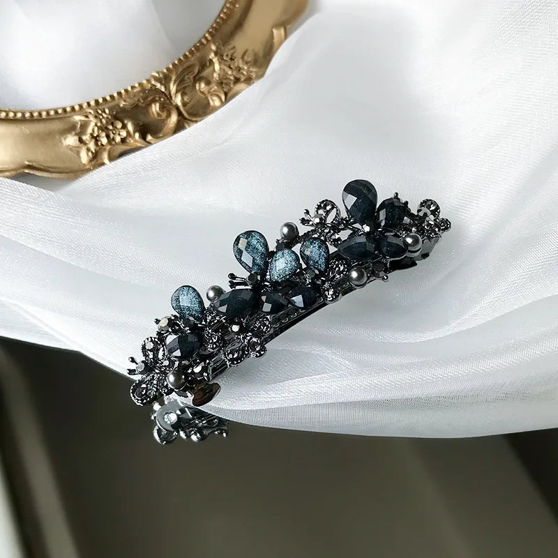 The new Korean version of the crystal flower spring hairpin elegant rhinestone wild ponytail hairpin women's hair accessories